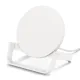 Belkin BOOST UP 10W Wireless Charging Stand displayed on a desk with a smartphone charging