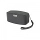 Remax RM-M1 Portable Bluetooth Speaker showcasing its sleek design and features in a modern setting