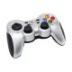 Logitech Wireless F710 Gamepad displayed on a desk with gaming setup