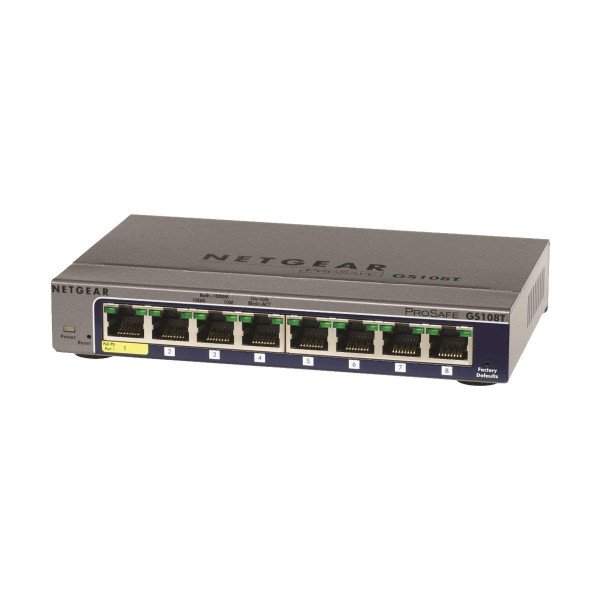Netgear GS108T 8 Port ProSafe Gigabit Managed Desktop Switch displayed on a wooden desk