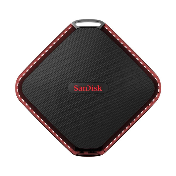 Sandisk Extreme 510 Portable SSD 480GB shown on a desk with a laptop, illustrating its compact design and portability